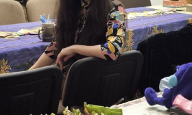 woman sitting and smiling