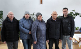 group of people with grocery bags