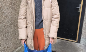 woman standing outside church entrance