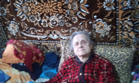 elderly woman in her home