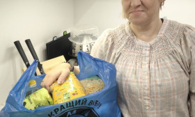 a woman in her home smiling