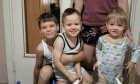 a mother with three children