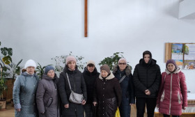 people standing with bags