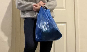 woman standing with products