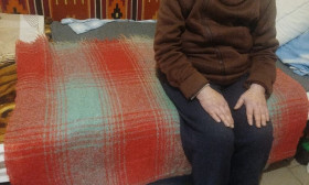 woman sitting with products