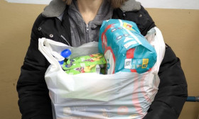 woman standing with products